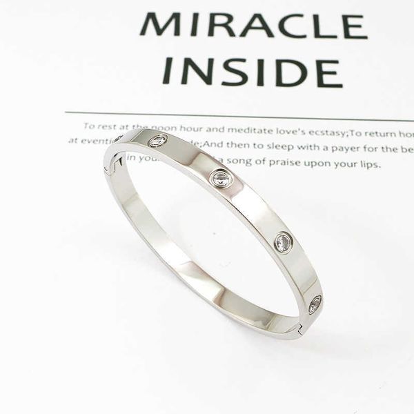 high-quality carti fashion 6mm ten diamond titanium open bracelet fashion full diamond stainless steel jewelry with logo, Black
high-quality carti fashion 6mm ten diamond titanium open bracelet fashion full diamond stainless steel jewelry with logo, Black