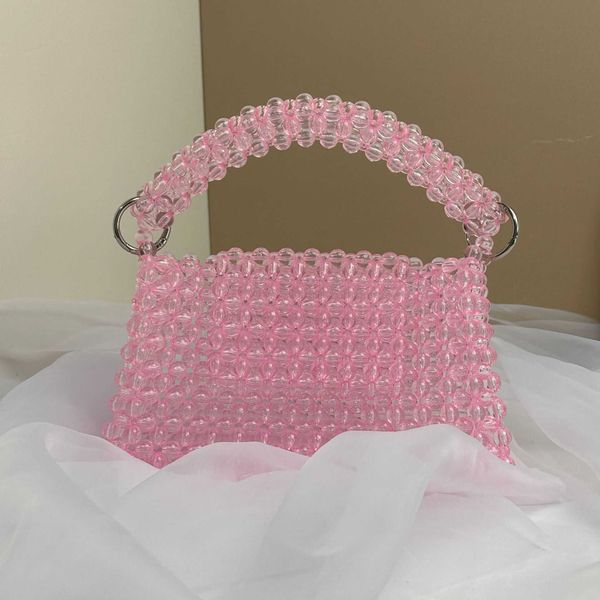 new creative transparent pink acrylic handheld beaded women's bag fashion casual versatile dinner bag 230625
new creative transparent pink acrylic handheld beaded women's bag fashion casual versatile dinner bag 230625