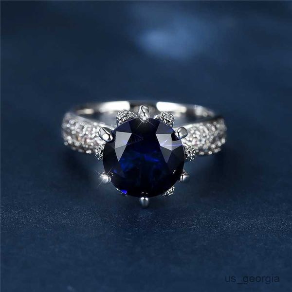 band rings luxury female big blue round ring charm silver color love engagement ring crystal zircon stone wedding rings for women r230625
band rings luxury female big blue round ring charm silver color love engagement ring crystal zircon stone wedding rings for women r230625