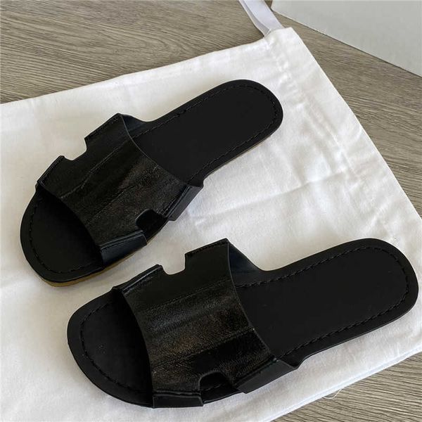 the row the * row eel leather slippers with round toe and exposed toe with a gold flat bottom and smoke rubber bottom worn on the beach for, Black
the row the * row eel leather slippers with round toe and exposed toe with a gold flat bottom and smoke rubber bottom worn on the beach for, Black