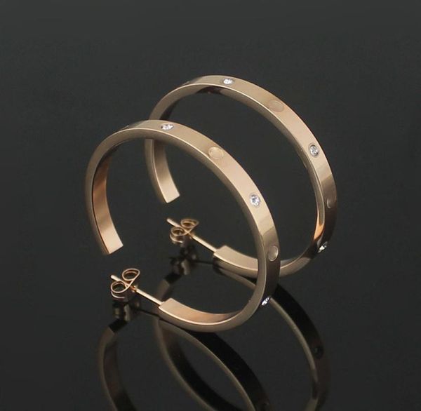 316l stainless steel love hoop earrings with crystal big earrings for women men couples fine jewlery whole7891852, Golden;silver
316l stainless steel love hoop earrings with crystal big earrings for women men couples fine jewlery whole7891852, Golden;silver