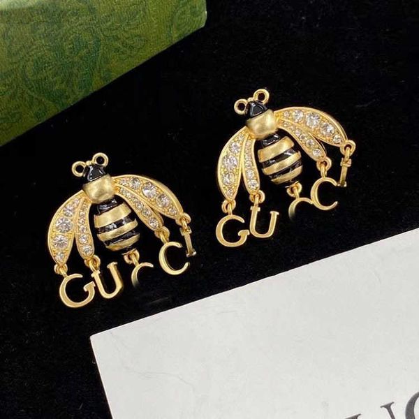 little bee dropping glue rhinestone letter popular design french silver needle earrings, Golden
little bee dropping glue rhinestone letter popular design french silver needle earrings, Golden
