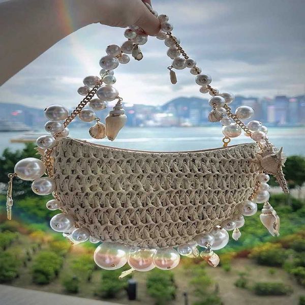 2023 new product network red same fashion versatile knitted pearl handmade small design handheld shoulder bag for women 2307
2023 new product network red same fashion versatile knitted pearl handmade small design handheld shoulder bag for women 2307