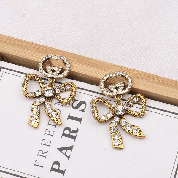 bow fashion personalized earnail design double interlocking classic matching earrings, Golden
bow fashion personalized earnail design double interlocking classic matching earrings, Golden