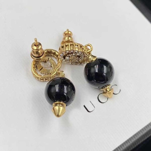 double water diamond black pearl long brass material silver needle small design and earrings, Golden
double water diamond black pearl long brass material silver needle small design and earrings, Golden