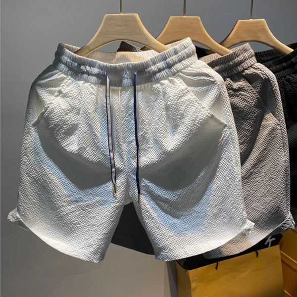men's summer ice shorts casual loose short beach pants comfortable sports quick drying clothing, White;black
men's summer ice shorts casual loose short beach pants comfortable sports quick drying clothing, White;black