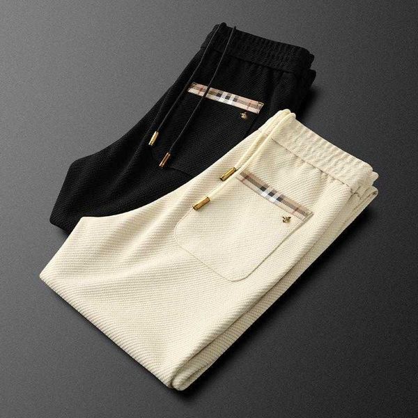 high version mens pants tb plaid embroidered sweatpants burb designer pants men women casual stretch leggings loose fitting joggers, Black
high version mens pants tb plaid embroidered sweatpants burb designer pants men women casual stretch leggings loose fitting joggers, Black