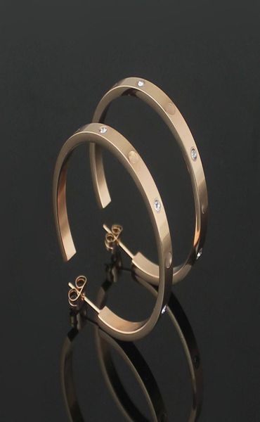 316l stainless steel love hoop earrings with crystal big earrings for women men couples fine jewlery whole3398321, Golden;silver
316l stainless steel love hoop earrings with crystal big earrings for women men couples fine jewlery whole3398321, Golden;silver