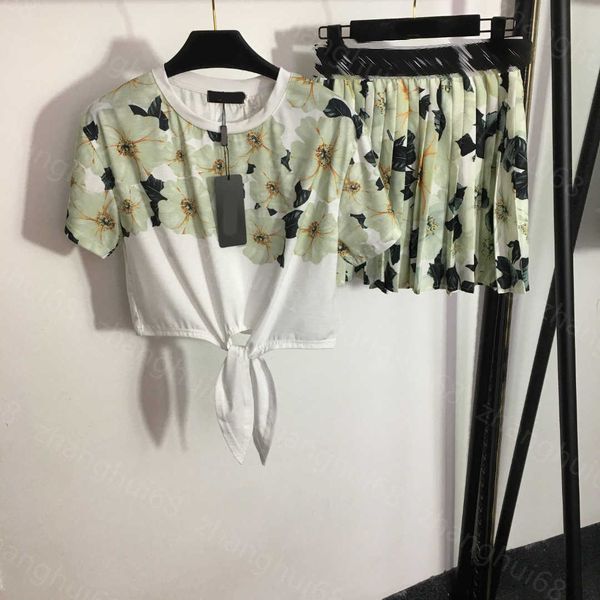 23ss skirt set womens designer clothing waist short crop short sleeve t-shirt floral print webbing high waist pleated short skirt sets women, White
23ss skirt set womens designer clothing waist short crop short sleeve t-shirt floral print webbing high waist pleated short skirt sets women, White