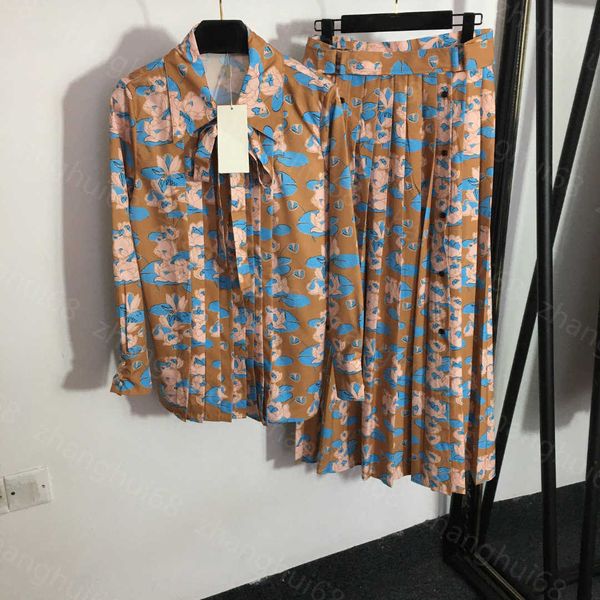 23ss womens designer clothing skirt set lotus print bow tie long sleeve shirt mid-length high waist pleated skirt sets womens clothing, White
23ss womens designer clothing skirt set lotus print bow tie long sleeve shirt mid-length high waist pleated skirt sets womens clothing, White