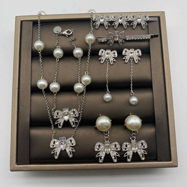 miao / miu family diamond studded bowknot pearl tassel long style celebrity temperament earrings hairpin necklace bracelet set, Golden;silver
miao / miu family diamond studded bowknot pearl tassel long style celebrity temperament earrings hairpin necklace bracelet set, Golden;silver