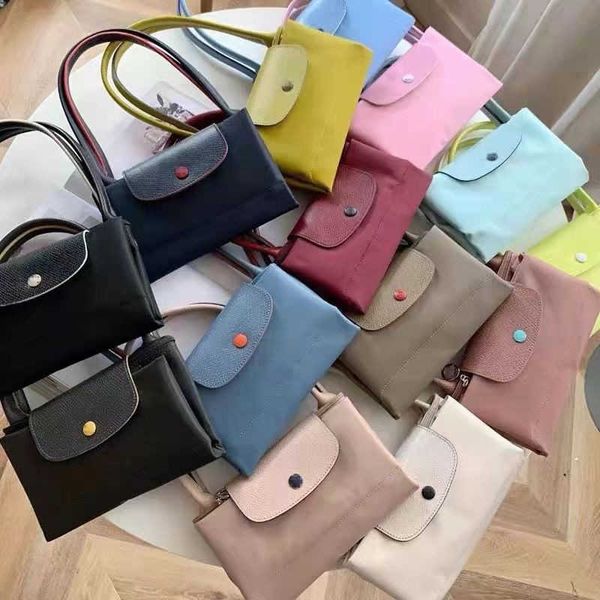 women's designer bags high version 70th anniversary one shoulder longxiang dumpling bag embroidered waterproof handheld large capacity
women's designer bags high version 70th anniversary one shoulder longxiang dumpling bag embroidered waterproof handheld large capacity
