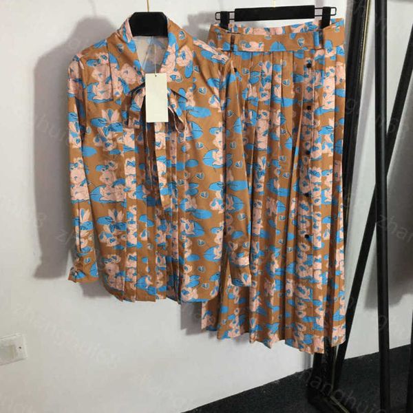 23ss womens designer clothing skirt set lotus print bow tie long sleeve shirt mid-length high waist pleated skirt sets womens clothing a1, White
23ss womens designer clothing skirt set lotus print bow tie long sleeve shirt mid-length high waist pleated skirt sets womens clothing a1, White