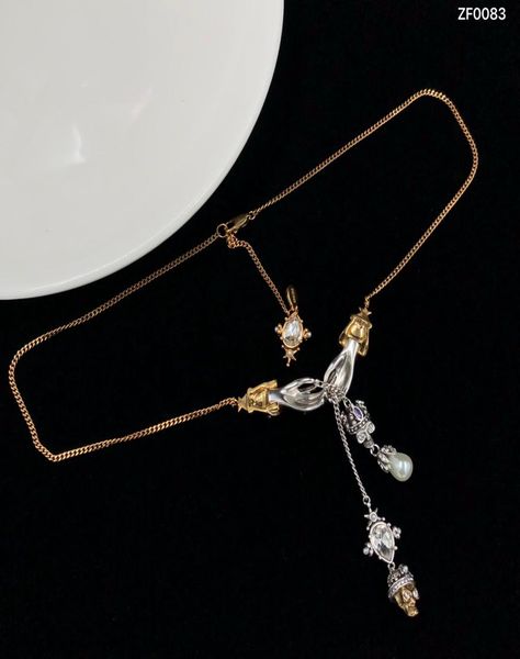 designermcqueen039s winged skeleton necklace is studded with diamonds to make it look better this is a classic hip hop accesso7316899, Silver
designermcqueen039s winged skeleton necklace is studded with diamonds to make it look better this is a classic hip hop accesso7316899, Silver