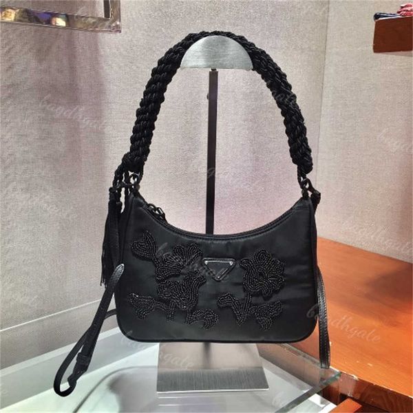 prad designer luxury bag limited edition embroidered beads nylon fabric handmade woven hardware removable long shoulder straps toggle and
prad designer luxury bag limited edition embroidered beads nylon fabric handmade woven hardware removable long shoulder straps toggle and