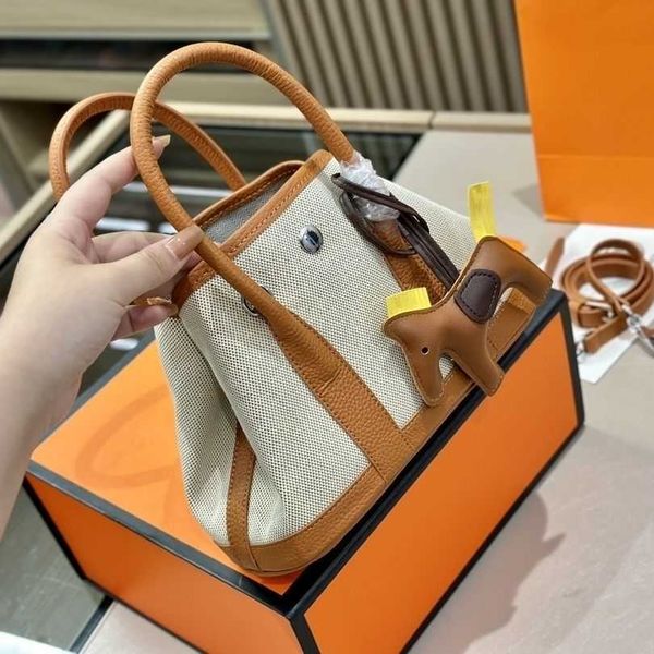 factory wholesale designer h ormes totes handbags size 24 * 16cm aimos garden bag the fabric is soft and has a great capacity have logo
factory wholesale designer h ormes totes handbags size 24 * 16cm aimos garden bag the fabric is soft and has a great capacity have logo