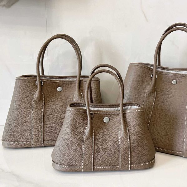 factory wholesale designer h ormes totes handbags 2023 new leather garden bag with lychee grain layer cow single shoulder messenger large ca
factory wholesale designer h ormes totes handbags 2023 new leather garden bag with lychee grain layer cow single shoulder messenger large ca