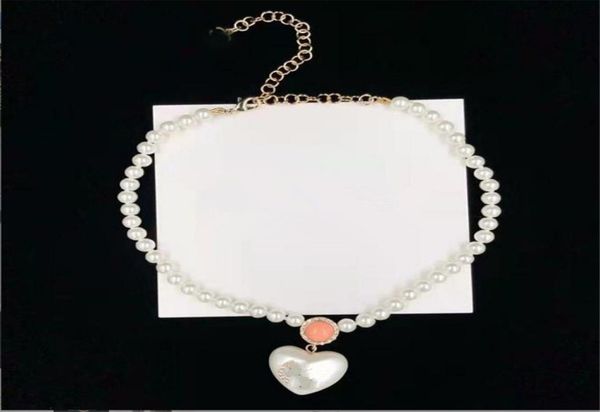 luxury jewelry heart shaped middle rhinestone pearl brass necklace european and american fashion simple sweater chain7359754, Golden;silver
luxury jewelry heart shaped middle rhinestone pearl brass necklace european and american fashion simple sweater chain7359754, Golden;silver