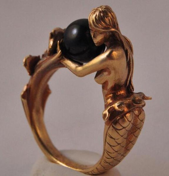 silver rose gold color mermaid holding black white pearl finger rings for women fashion brand party jewelry girls gifts bague7882793, Golden;silver
silver rose gold color mermaid holding black white pearl finger rings for women fashion brand party jewelry girls gifts bague7882793, Golden;silver