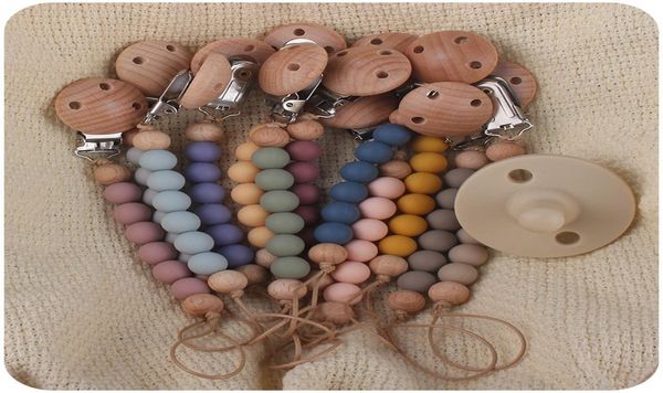 12 colors beech wooden silicone bead pacifier holders newborn pacifier chains clips baby teething soother kids chew toys z49491746281
12 colors beech wooden silicone bead pacifier holders newborn pacifier chains clips baby teething soother kids chew toys z49491746281