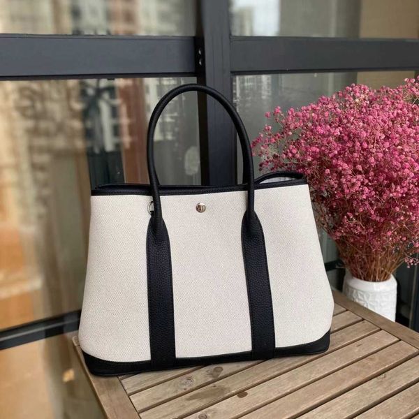 factory wholesale designer h ormes totes handbags auyaouya 2023 new womens head layer cowhide with canvas classic versatile fashion garden b
factory wholesale designer h ormes totes handbags auyaouya 2023 new womens head layer cowhide with canvas classic versatile fashion garden b