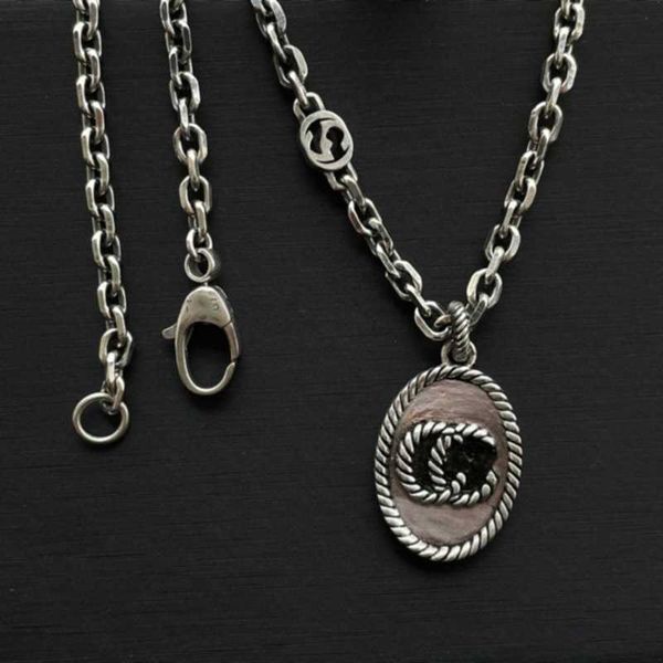 silver antique fried dough twists letter necklace oval carved pendant for men and women
silver antique fried dough twists letter necklace oval carved pendant for men and women