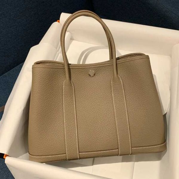 factory wholesale designer h ormes totes handbags garden bag 2023 new fashion leather large capacity travel tote portable mommy bucket bride
factory wholesale designer h ormes totes handbags garden bag 2023 new fashion leather large capacity travel tote portable mommy bucket bride