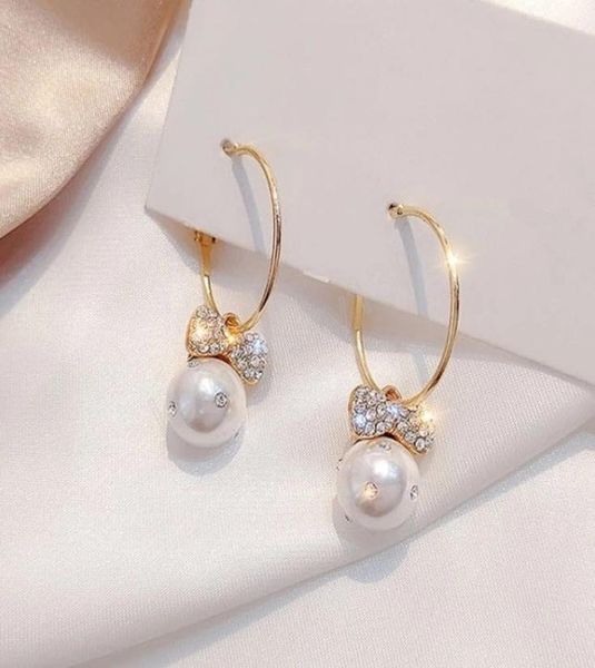 fashion korean elegant crystal bowknot imitation pearl hoop earrings for women exquisite rhinestone earring8495293, Golden;silver
fashion korean elegant crystal bowknot imitation pearl hoop earrings for women exquisite rhinestone earring8495293, Golden;silver