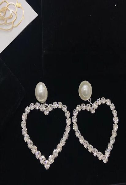 2018 european and american fashion diamond heart earrings big pearl earrings jewelry counters with the same paragraph 2722267, Golden;silver
2018 european and american fashion diamond heart earrings big pearl earrings jewelry counters with the same paragraph 2722267, Golden;silver