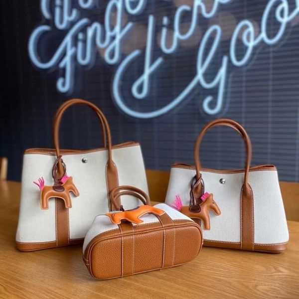 factory wholesale designer h ormes totes handbags htgo begonia purchase 2023 new cowhide togo garden bag with canvas 30 premium shopping tot
factory wholesale designer h ormes totes handbags htgo begonia purchase 2023 new cowhide togo garden bag with canvas 30 premium shopping tot