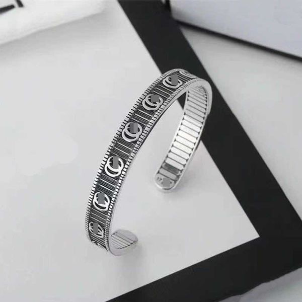 sterling silver simple open personality vertical stripe bracelet for men and women, Black
sterling silver simple open personality vertical stripe bracelet for men and women, Black