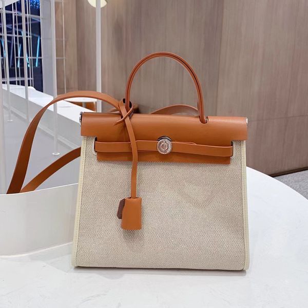 luxury designer bag women tote bag contrast color genuine leather canvas panel fashion retro kelly crossbody bag
luxury designer bag women tote bag contrast color genuine leather canvas panel fashion retro kelly crossbody bag