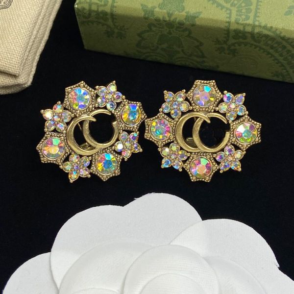 with pouch fashion style stud earrings hollow letter colorful diamonds luxury brass women designer earrings, Golden;silver
with pouch fashion style stud earrings hollow letter colorful diamonds luxury brass women designer earrings, Golden;silver