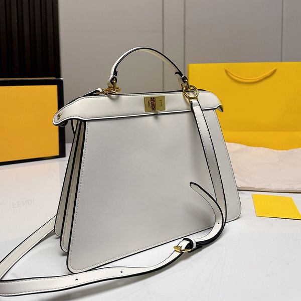ladies handbag fashion design revolving buckle luxury designer shoulder bag with smooth texture size 32 25cm
ladies handbag fashion design revolving buckle luxury designer shoulder bag with smooth texture size 32 25cm