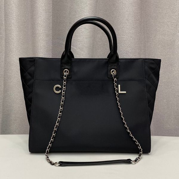 36cm nylon women designer jumbo beach shopping bag with leather handle silver letter metal hardware chain high capacity shoulder handbag lux
36cm nylon women designer jumbo beach shopping bag with leather handle silver letter metal hardware chain high capacity shoulder handbag lux