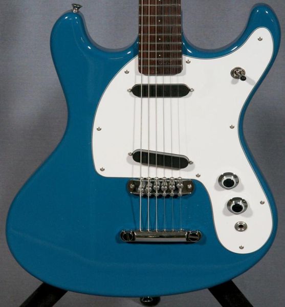 rare 1966 ventures johnny ramone mos mark ii blue electric guitar tuneamatic and stailpiece 2 single coil pickups white pick4755617
rare 1966 ventures johnny ramone mos mark ii blue electric guitar tuneamatic and stailpiece 2 single coil pickups white pick4755617