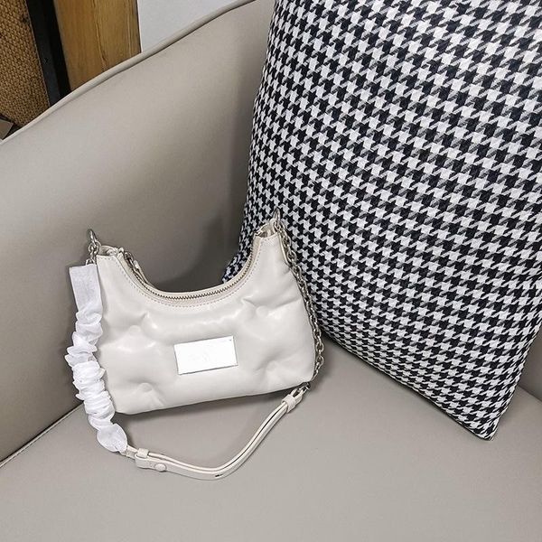 2023 new mini underarm soft leather diagonal straddle bag women's bag shoulder bag white black size quality
2023 new mini underarm soft leather diagonal straddle bag women's bag shoulder bag white black size quality