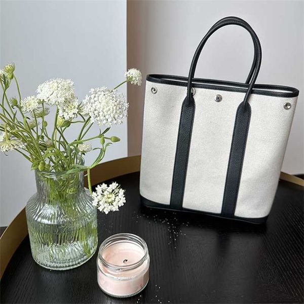 totes 7a h ermess garden party handbag genuine leather large capacity genuine leather canvas 28cm vertical simple handheld crossbody commute
totes 7a h ermess garden party handbag genuine leather large capacity genuine leather canvas 28cm vertical simple handheld crossbody commute