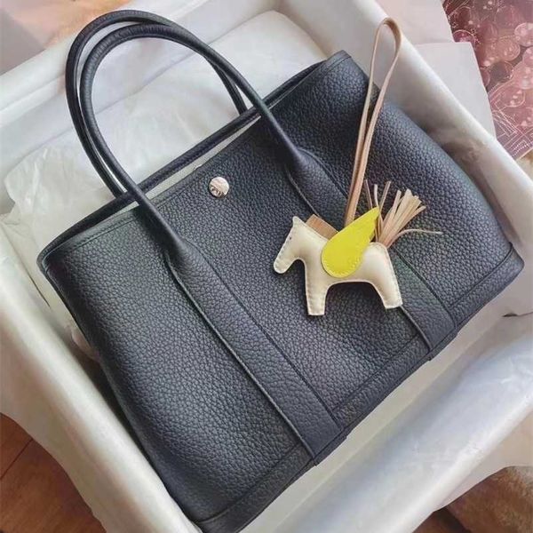 totes 7a h ermess garden party handbag genuine leather pure handmade epsom leather shoulder with lychee pattern negonda leather shell portab
totes 7a h ermess garden party handbag genuine leather pure handmade epsom leather shoulder with lychee pattern negonda leather shell portab
