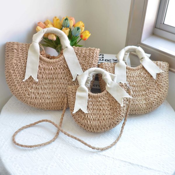 new letter ribbon handwoven paper rope moon grass woven round bucket handbag large medium and small ins vacation
new letter ribbon handwoven paper rope moon grass woven round bucket handbag large medium and small ins vacation