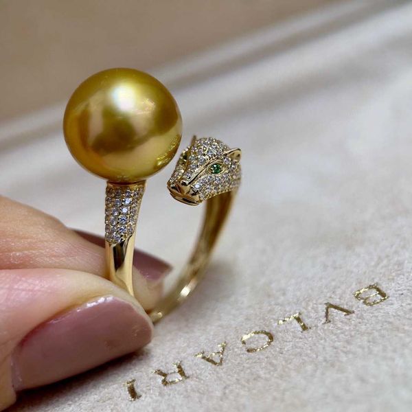 high-quality carti leopard head strong tea gold compares seawater pearl ring 24k almost flawless 12-11mm925 sterling silver with logo
high-quality carti leopard head strong tea gold compares seawater pearl ring 24k almost flawless 12-11mm925 sterling silver with logo