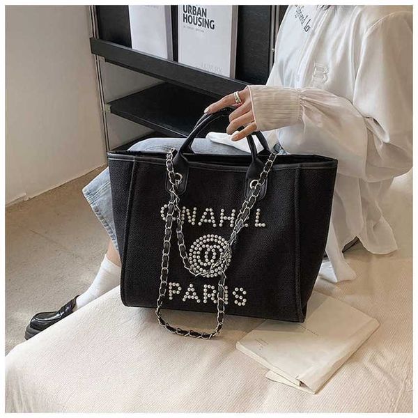 large capacity women's bag new fashion commuter big bag chain beaded versatile one shoulder tote bag 50% clearance sale
large capacity women's bag new fashion commuter big bag chain beaded versatile one shoulder tote bag 50% clearance sale