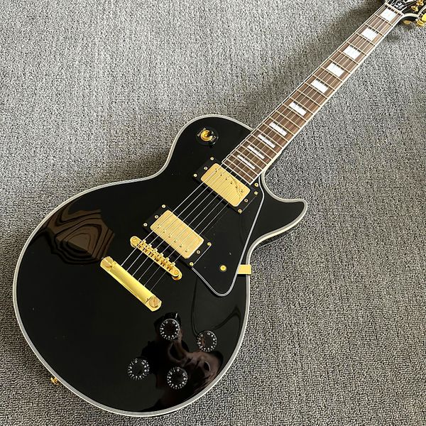 custom shop, caston black electric guitar, rosewood fingerboard, gold hardware, ing
custom shop, caston black electric guitar, rosewood fingerboard, gold hardware, ing