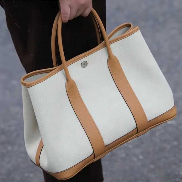 totes 7a h ermess garden party handbag genuine leather canvas with contrasting colored layer cowhide leather for commuting leisure large cap
totes 7a h ermess garden party handbag genuine leather canvas with contrasting colored layer cowhide leather for commuting leisure large cap