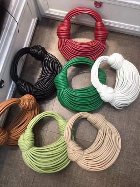 fashion designer woven bag personalized womens bag lamian noodles handbag imported sheepskin pendant soft shape
fashion designer woven bag personalized womens bag lamian noodles handbag imported sheepskin pendant soft shape