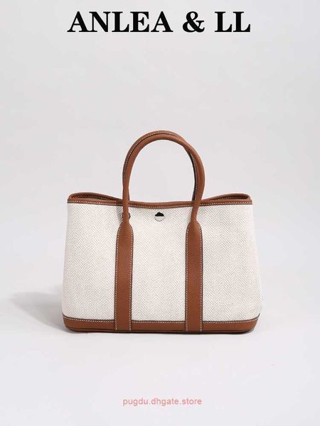 factory outlet wholesale h home party garden tote bags for sale fashionable large capacity handbag genuine leather bag canvas color contrast
factory outlet wholesale h home party garden tote bags for sale fashionable large capacity handbag genuine leather bag canvas color contrast