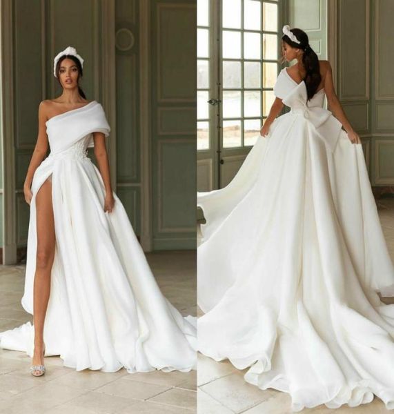one shoulder float wedding dresses thigh high slit appliqued 2020 new bridal gowns with big bow sweep train robe de mariee2307421, White
one shoulder float wedding dresses thigh high slit appliqued 2020 new bridal gowns with big bow sweep train robe de mariee2307421, White