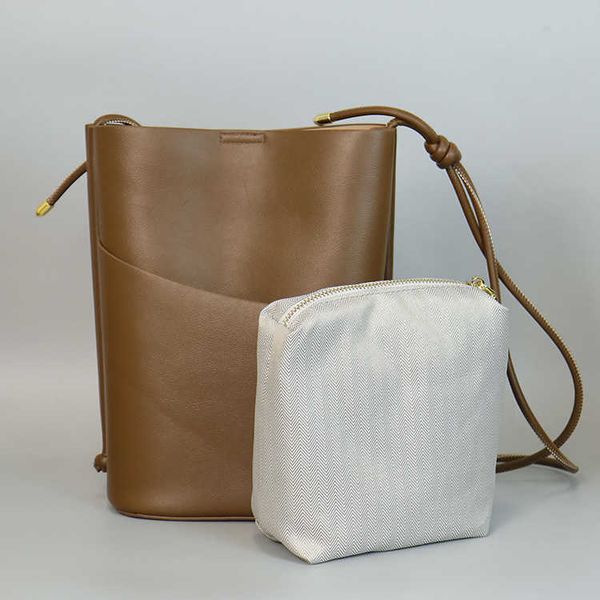 commuter women's bag leather bucket bag high-end niche design bag women's new single shoulder crossbody tote bag
commuter women's bag leather bucket bag high-end niche design bag women's new single shoulder crossbody tote bag