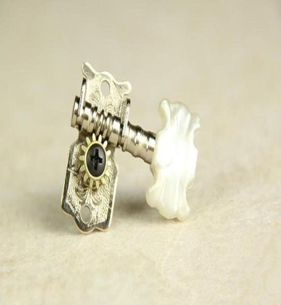 6pcsset 3r3l classical guitar strings button guitar accessories for tuning pegs keys tuner machine heads guitar parts5101483
6pcsset 3r3l classical guitar strings button guitar accessories for tuning pegs keys tuner machine heads guitar parts5101483