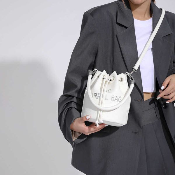 baobao women's new small crowd drawn letter bucket bag fashion trend handheld one shoulder crossbody bag
baobao women's new small crowd drawn letter bucket bag fashion trend handheld one shoulder crossbody bag